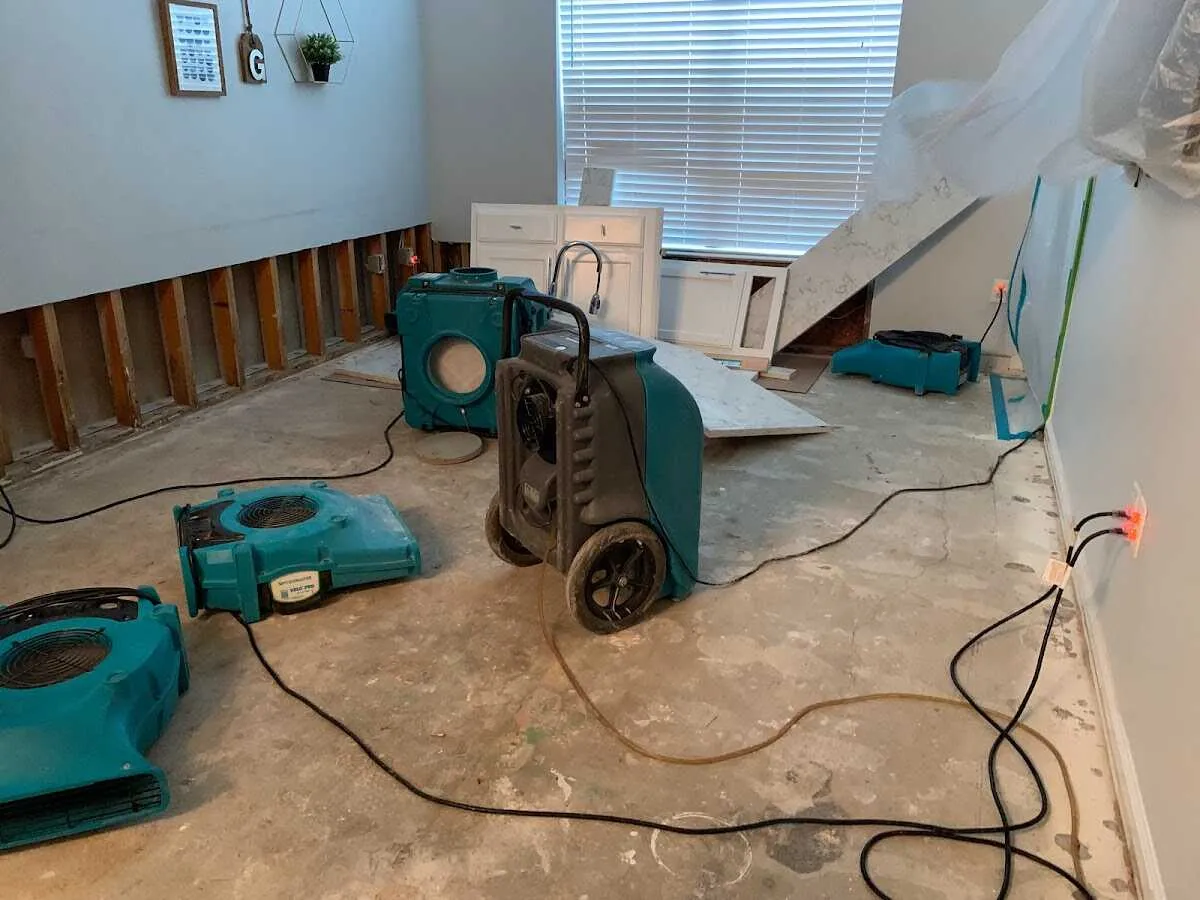 Dehumidifier in flood-cut room for Water Damage Restoration in Vancouver